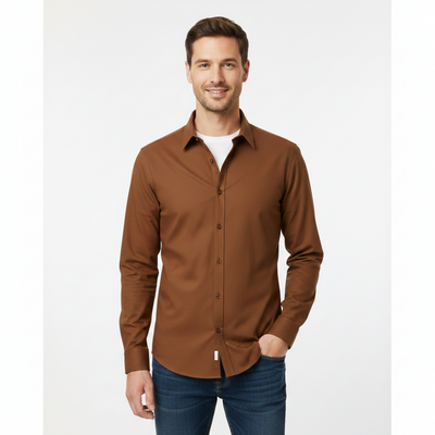 Man wearing a brown button-up shirt and blue jeans on a white background