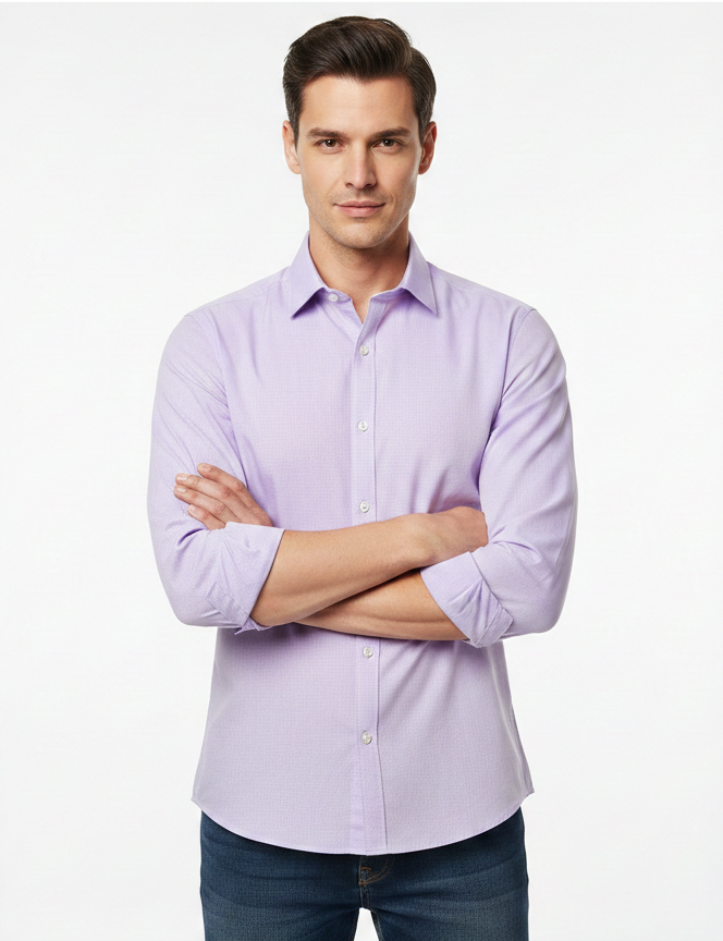 Man wearing a light purple dress shirt with rolled-up sleeves on a white background